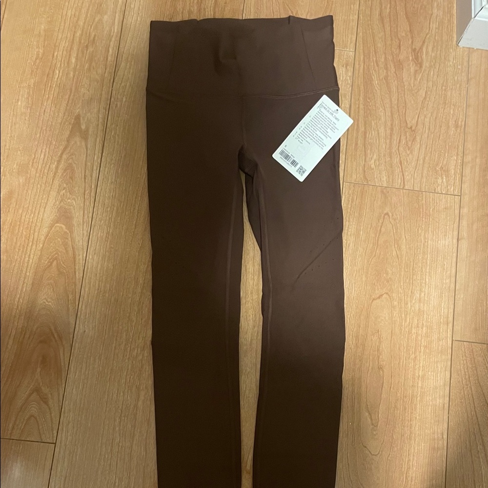 Brand new. Lululemon. Size 4. Zoned in Tights.